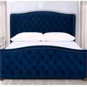 TIMOTTHY'S EXECUTIVE STYLE GHESTERFIELD SLEIGH BED